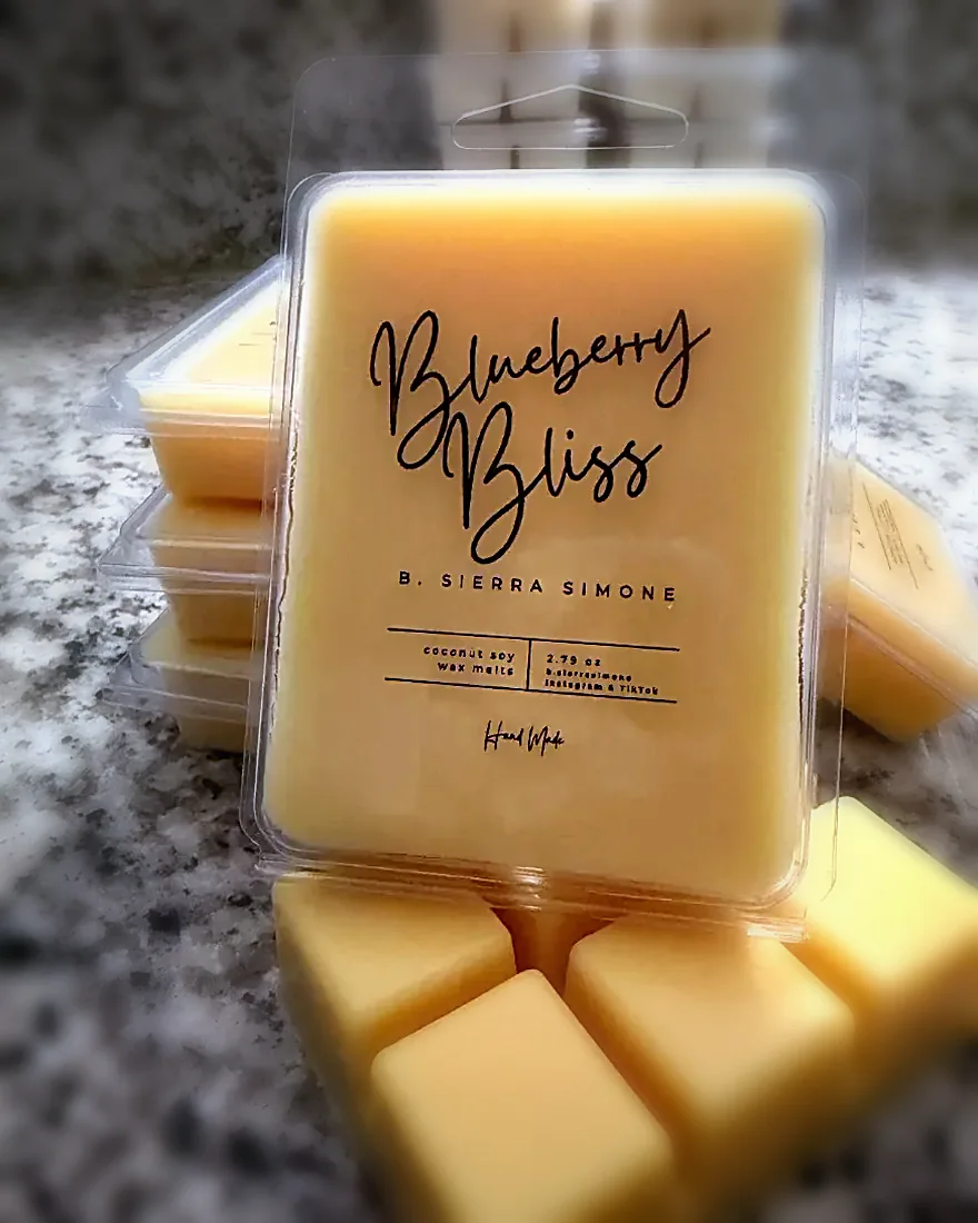 Blueberry Bliss wax melts in a hand-labelled clamshell on a granite counter